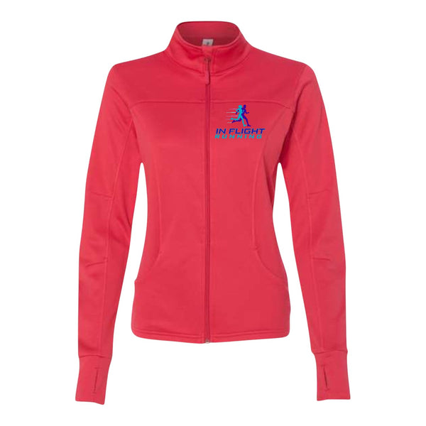 In Flight Running coral pink polyester fleece track jacket with embroidered logo, thumbholes, and contrast sleeve stripes.
