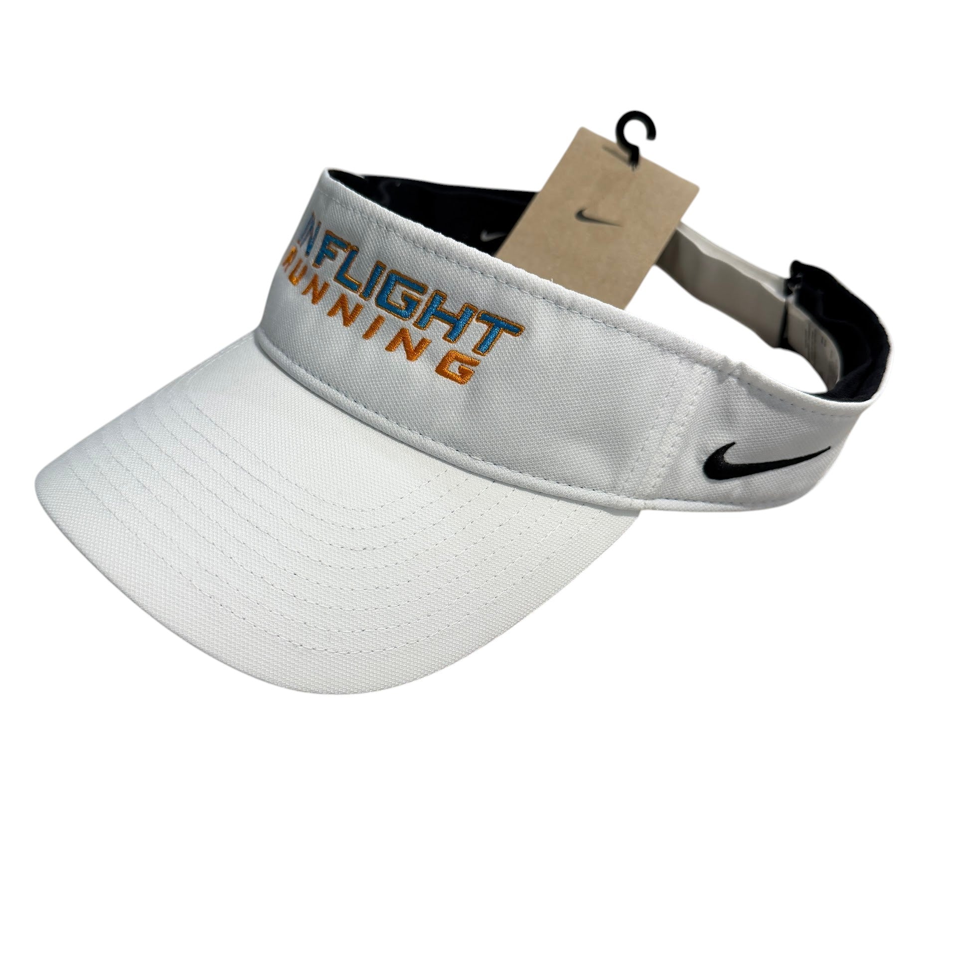 White Nike Dry-Fit performance running visor with orange and blue embroidered "IN FLIGHT RUNNING" text and a black Swoosh logo.