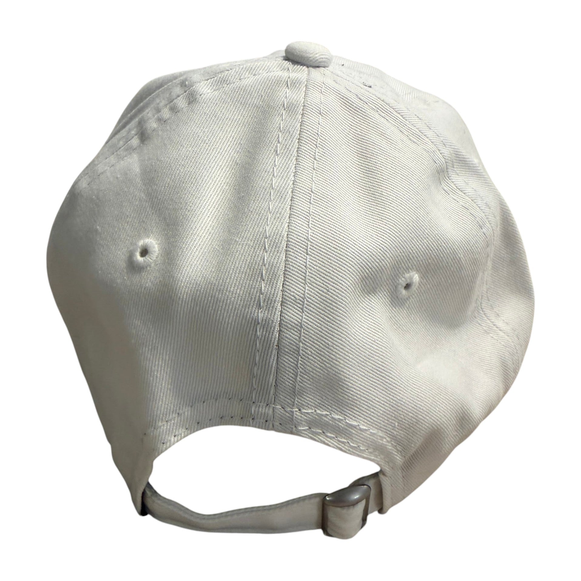 In Flight Running white unstructured cotton cap with adjustable strap and embroidered logo. Relaxed fit for running or casual wear.